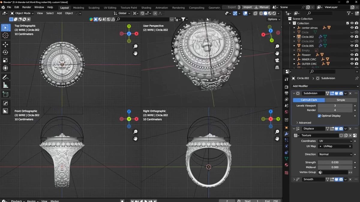 A gold ring sitting beside a computer monitor showing 3D jewelry design software.