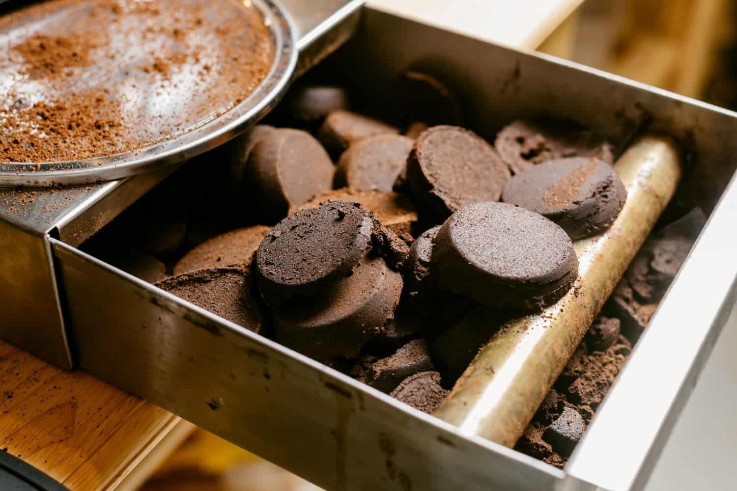Different coffee grind sizes arranged in bowls for various culinary and skincare applications.