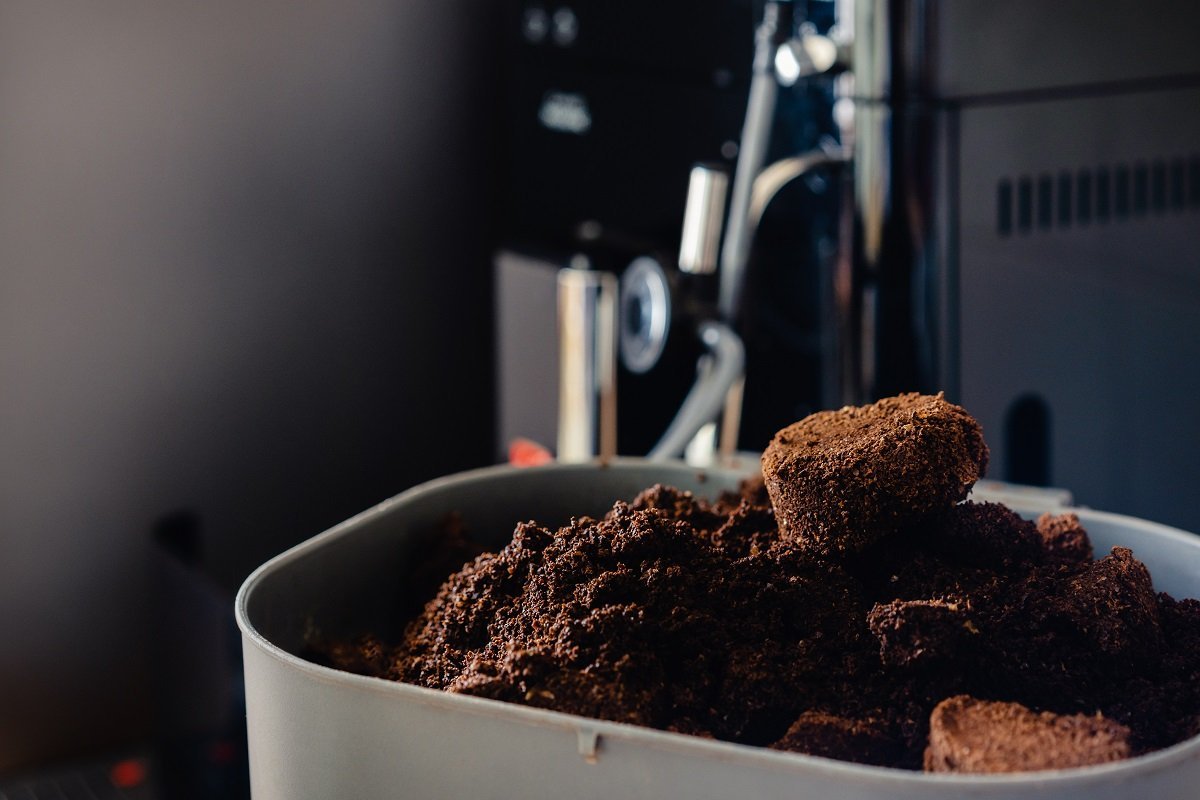 A clean workspace setup for learning about ground coffee usage.