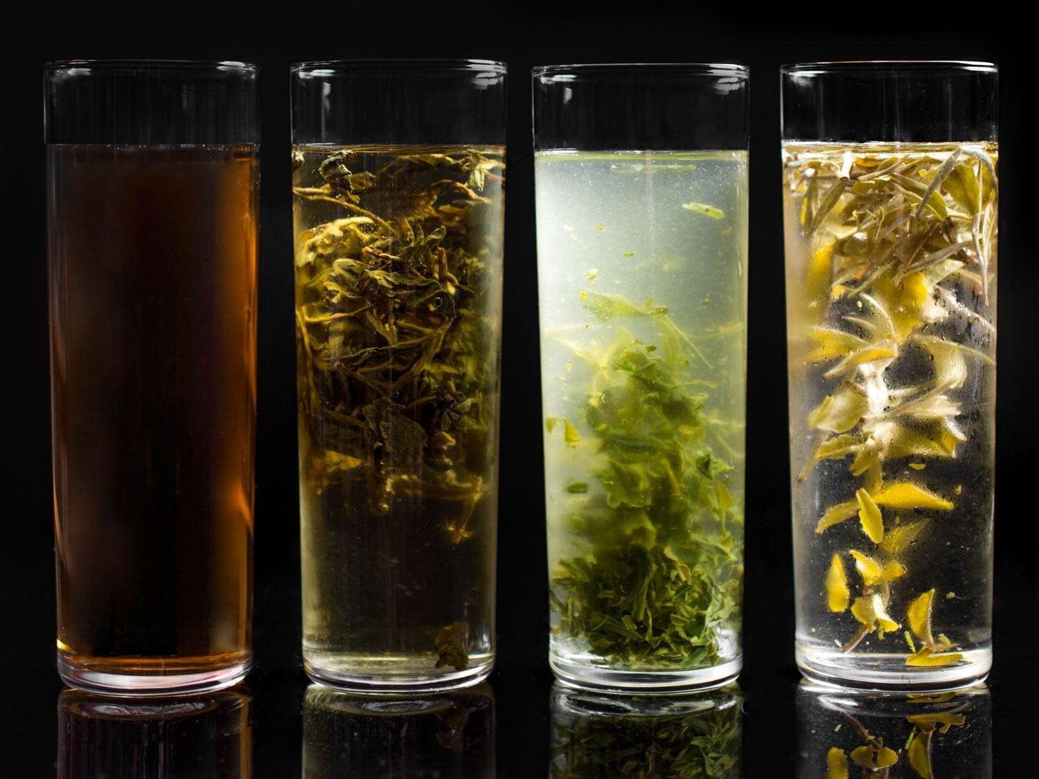 Glass jar of cold brew coffee steeping on a marble counter